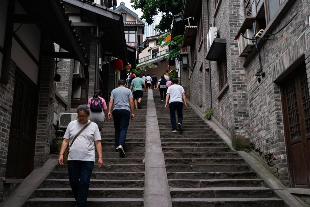 Chongqing stone stairways connecting different city levels through buildings