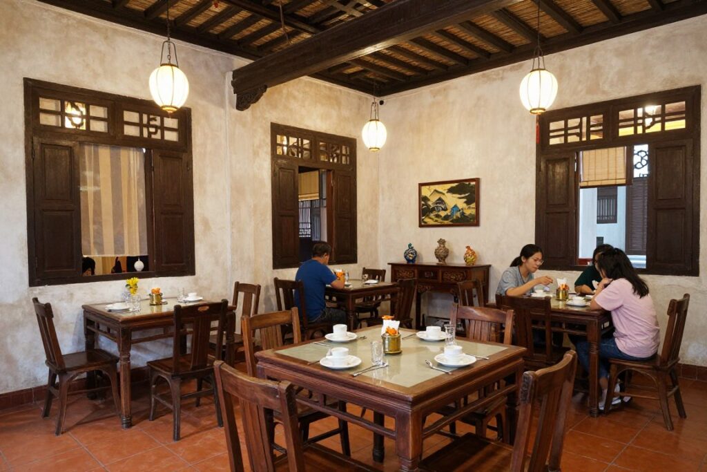 Interior of traditional Nyonya restaurant in Malacca with heritage decor