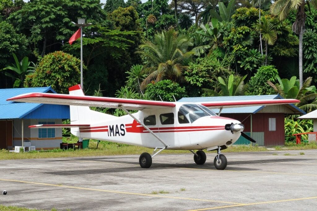 Small airplane at rural Sarawak airstrip