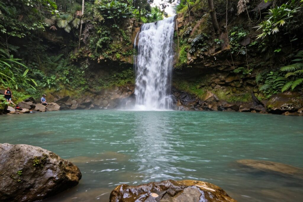 Tibumana waterfall with large natural swimming pool